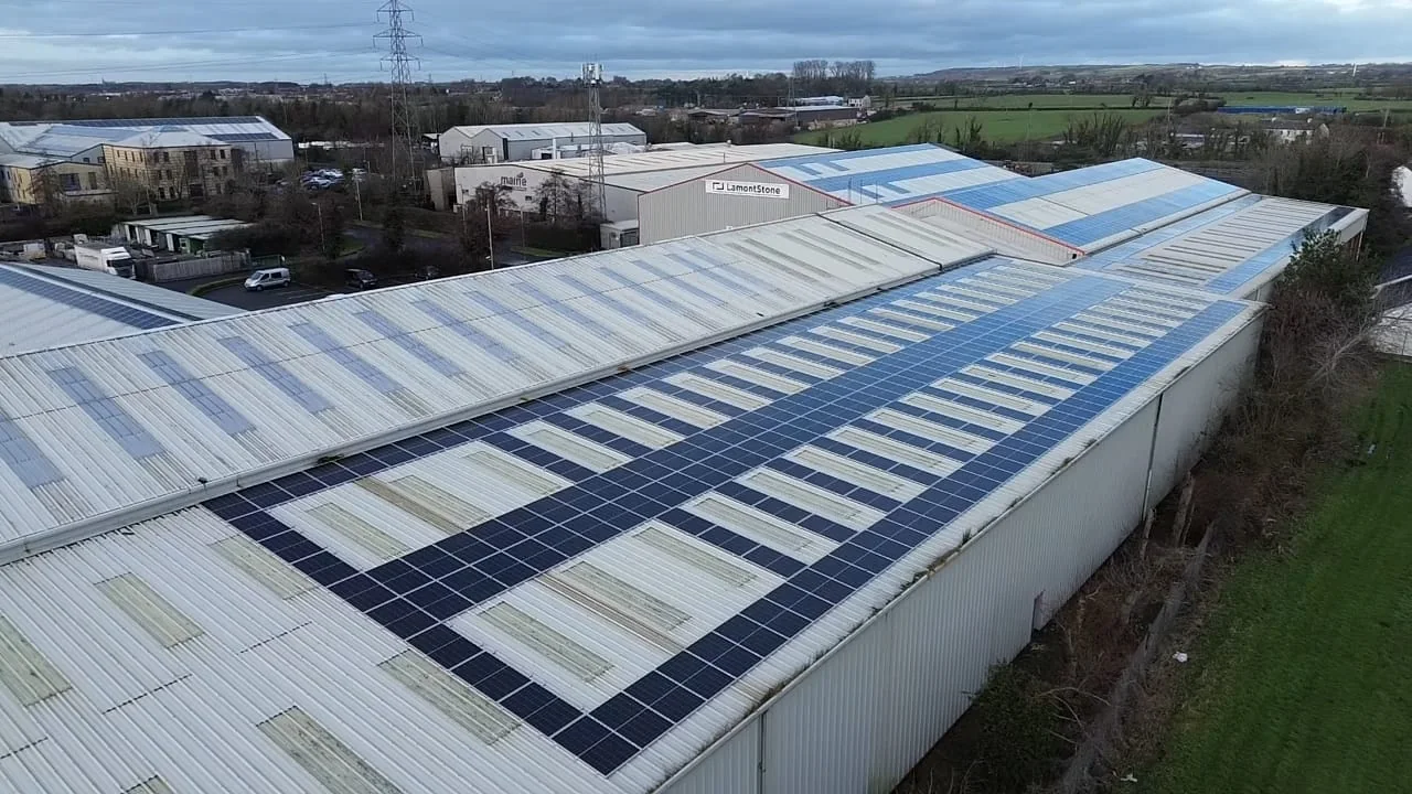 Aerial view of commercial solar panels on the factory roof at Lamont Stone, Coleraine