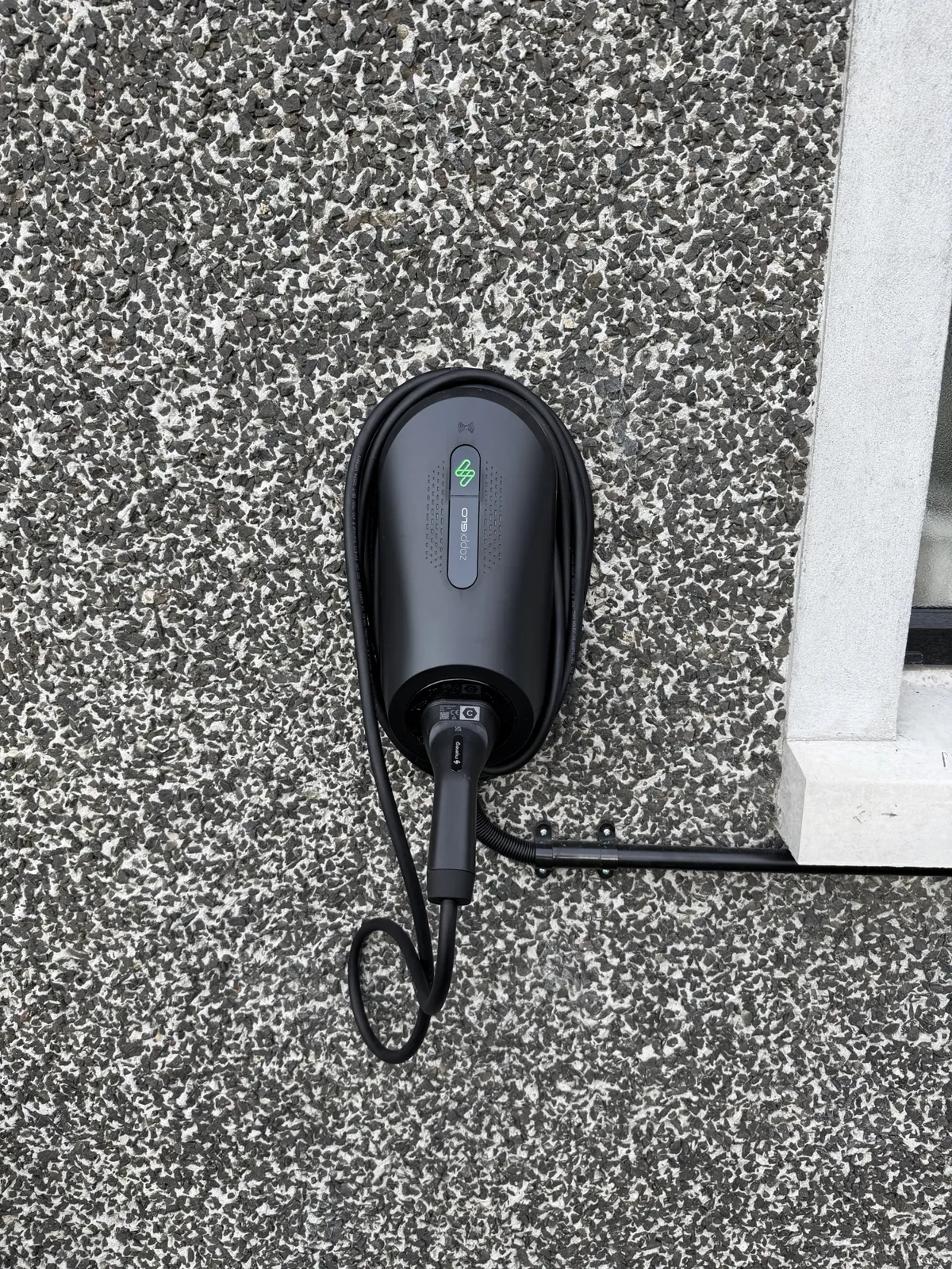 myenergi zappi GLO EV charger on a wall